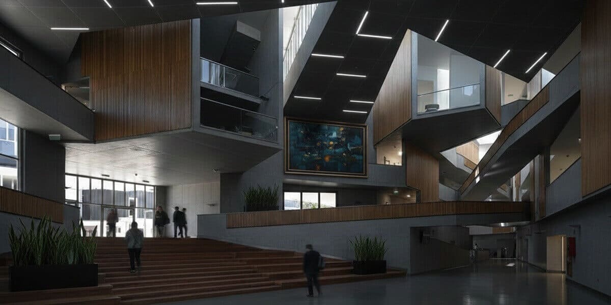 Expansive multi-level corporate atrium with a high-ceiling gallery wall and central landscape art.